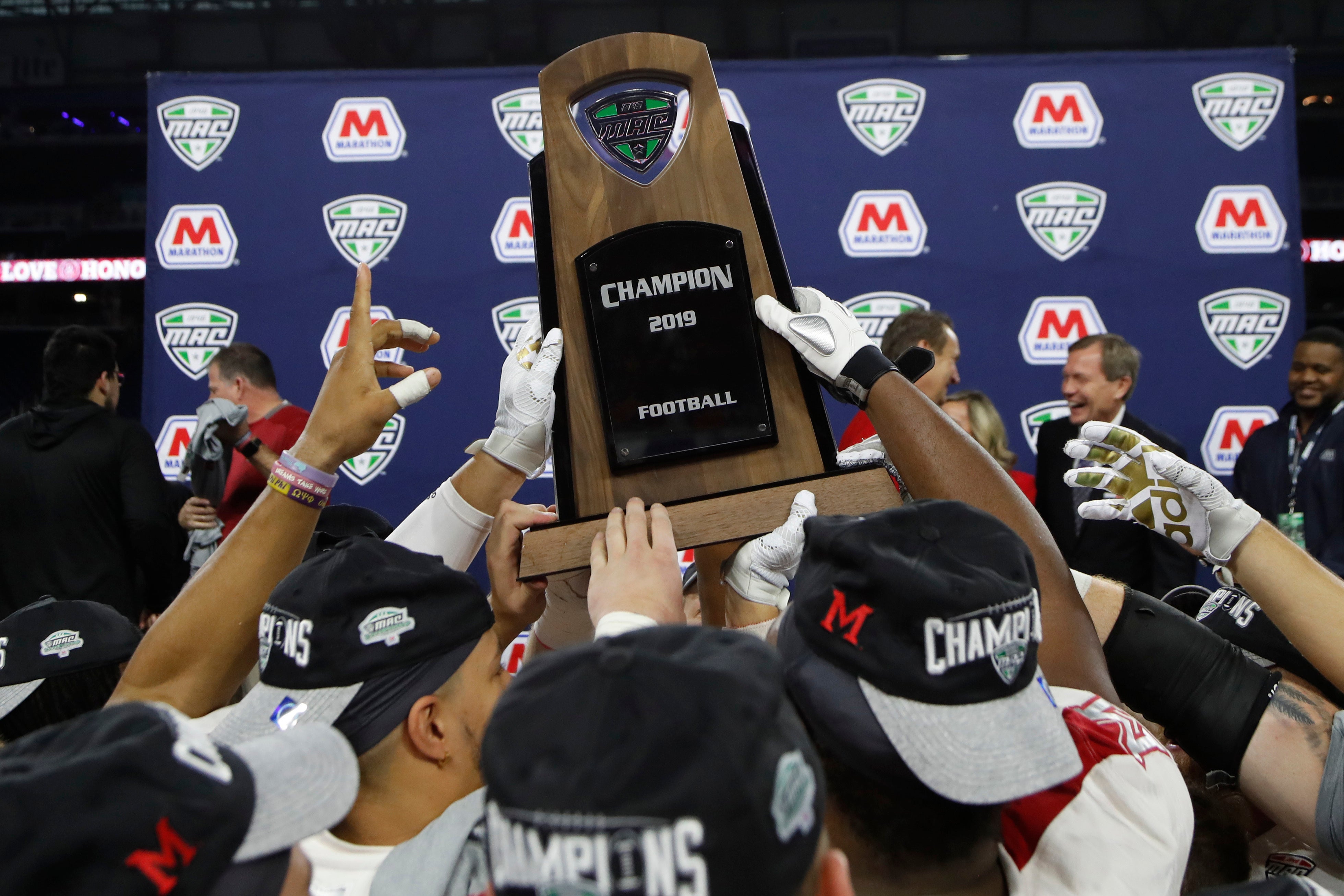 Virus Outbreak College Sports Football
