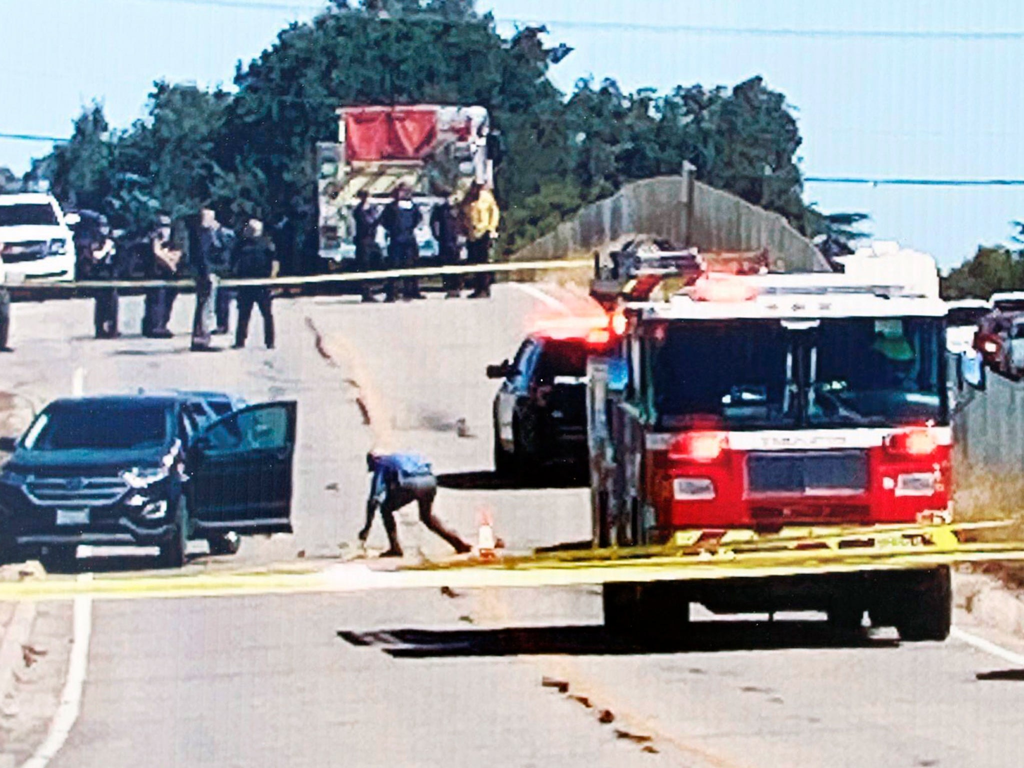 Investigators work the scene of a shooting, Thursday, Sept. 24, 2020 in Templeton, California