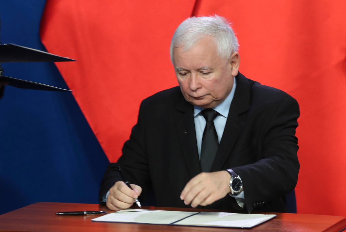 Poland's ruling party signs new coalition deal with partners Law and