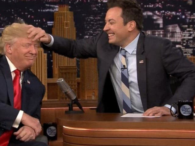 <p>Jimmy Fallon musses Donald Trump's hair in his controversial 2016 interview</p>