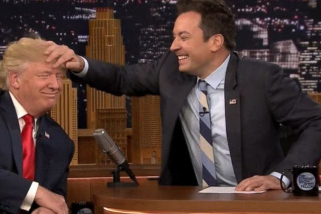 <p>Jimmy Fallon musses Donald Trump's hair in his controversial 2016 interview</p>