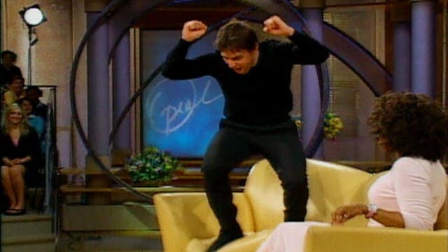 Tom Cruise jumping on  the sofa in the notorious Oprah intervview