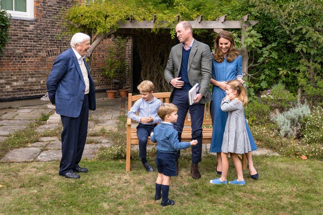 Sir David Attenborough presents Prince George with a shark tooth fossil