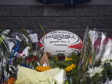 Silence at rugby game to honour ‘truly remarkable’ sergeant shot dead inside police station
