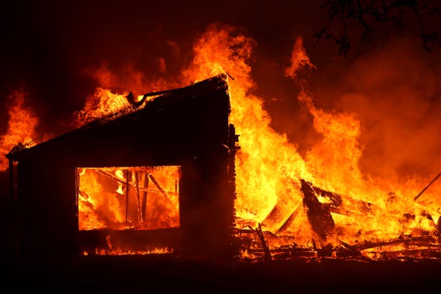 Family drives through "Fire Tornado" in Solimar, California