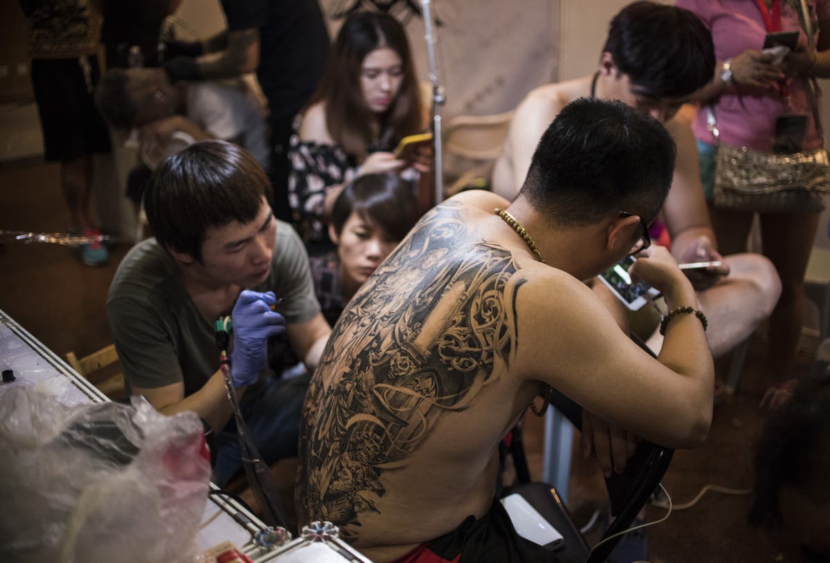 ‘Simply discriminatory’: Chinese city orders taxi drivers to remove tattoos