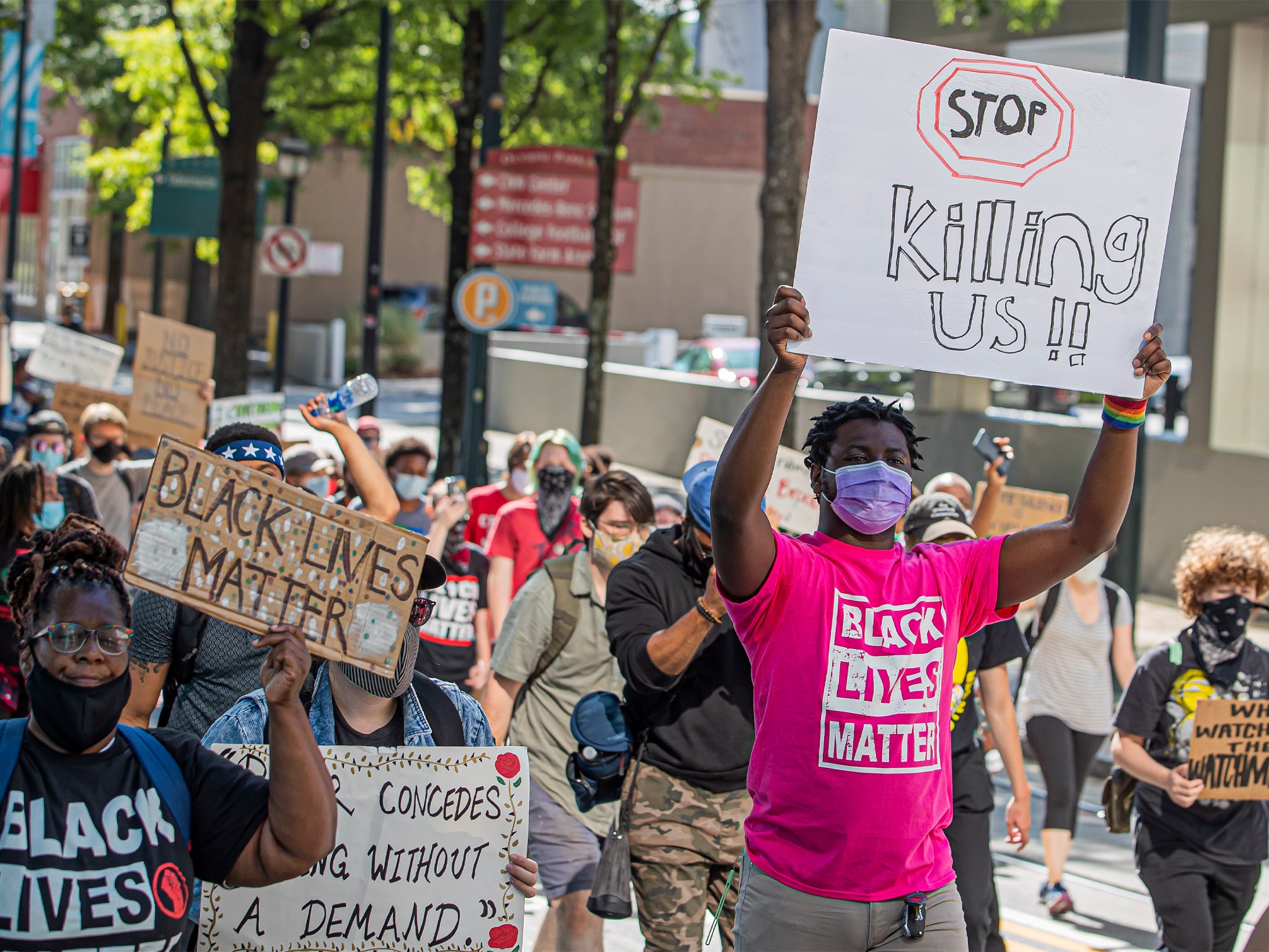 Black Lives Matter demonstrators march through the streets in the wake of the Atlanta Police deadly shooting of Rayshard Brooks in Atlanta, Georgia, 16 June 2020