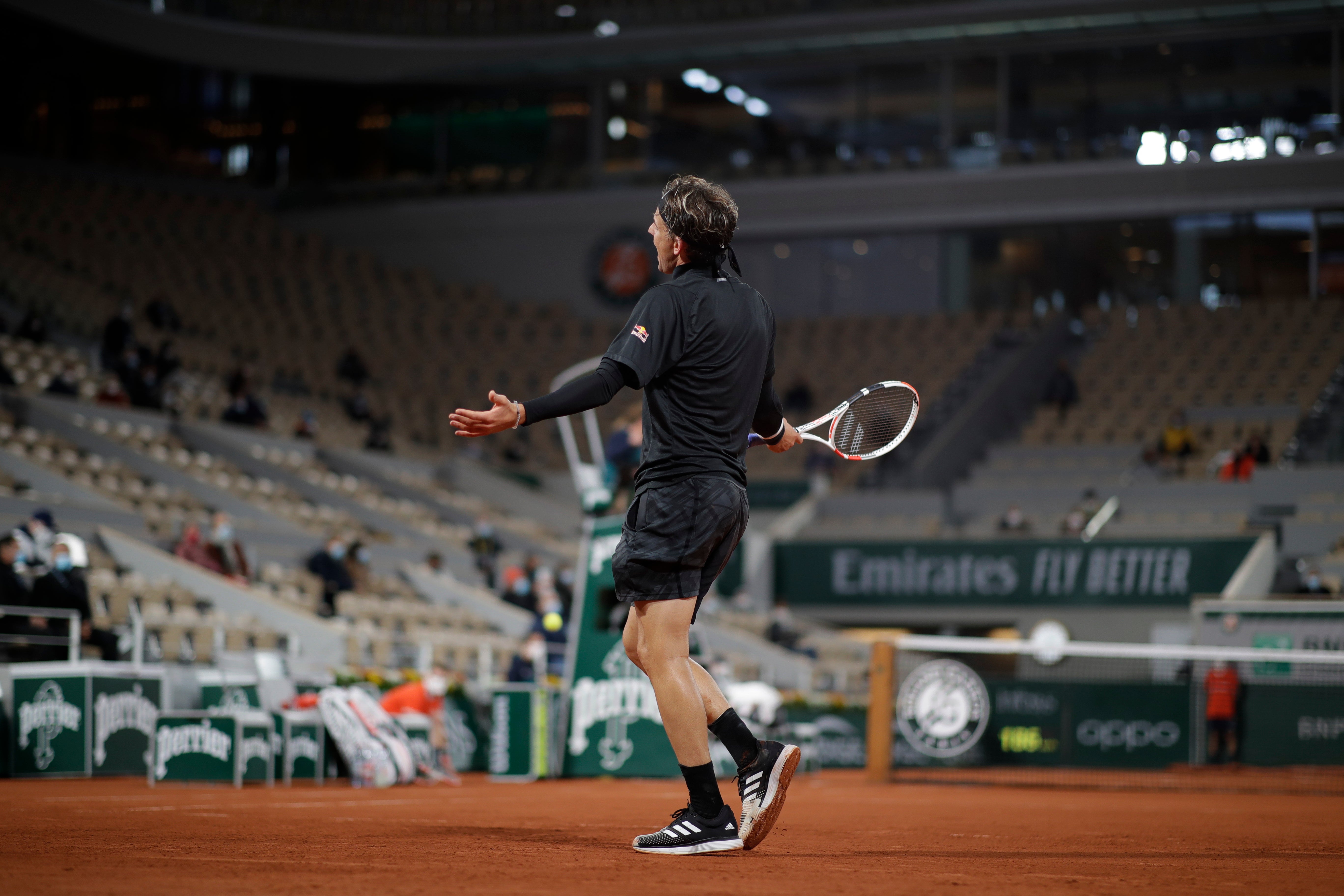 Thiem right at home in 1stround win at a chilly French Open AP home
