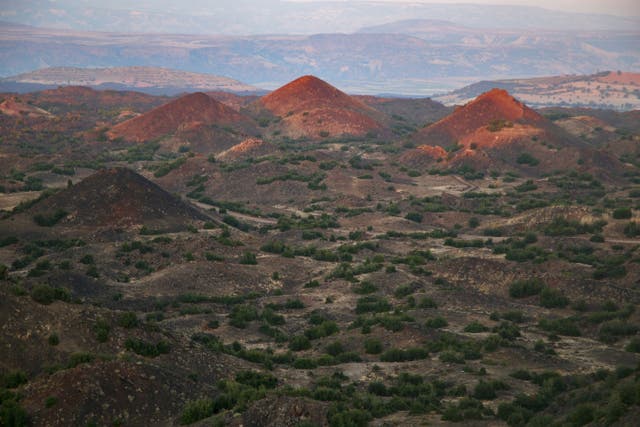 Extinct volcano cones are pictured by drone in Kula-Salihli Geopark, Manisa, Turkey.