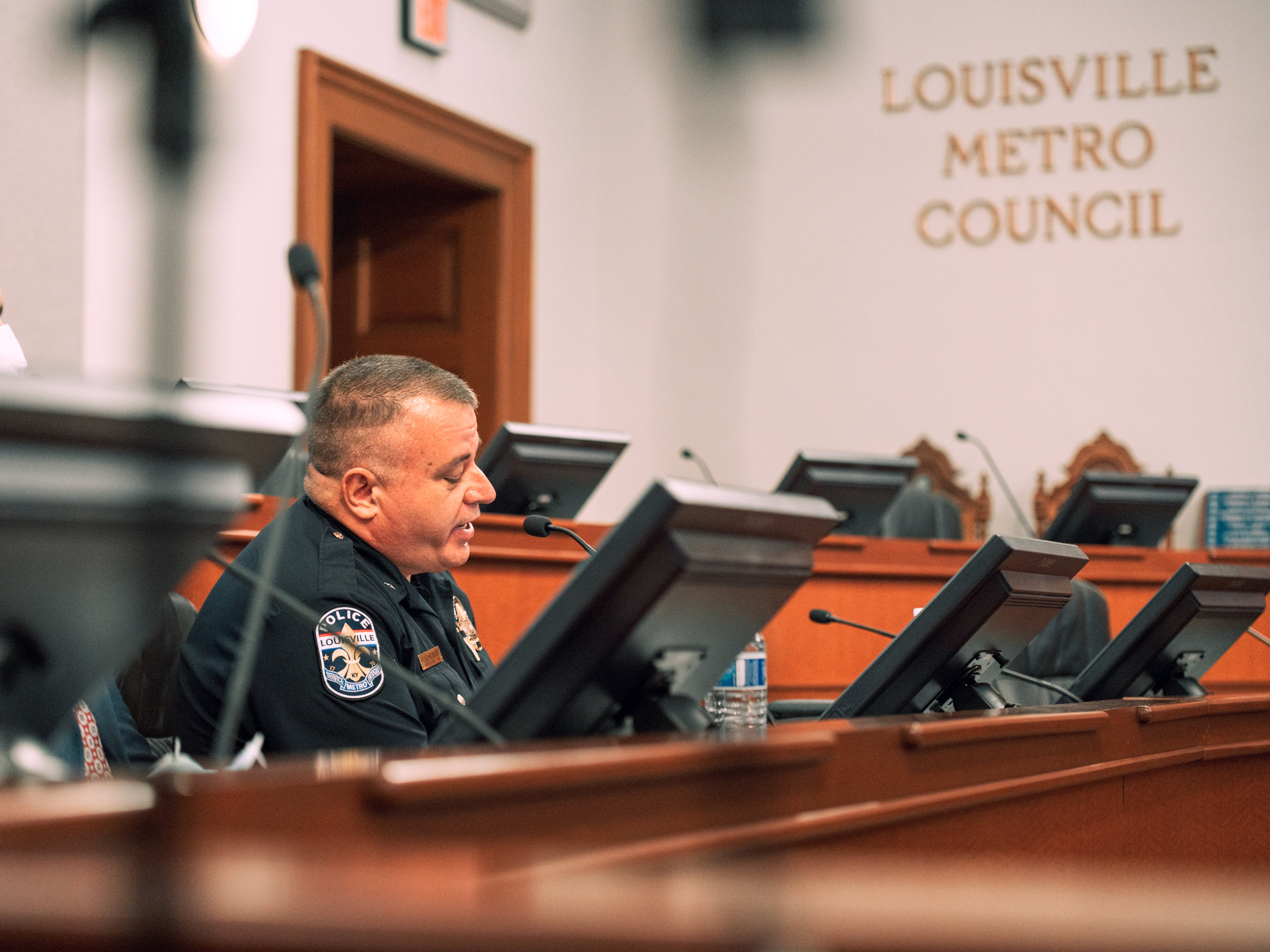 Interim police chief Robert Shroeder sits before Metro Council's Government Oversight and Audit Committee to address how police have handled protests and unrest in the response to no charged being given to officers who killed of Breonna Taylor