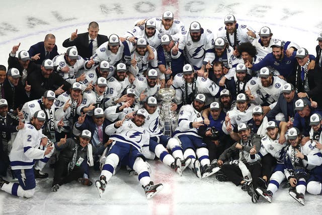 The Tampa Bay Lightning pose for their team photo with the Stanley Cup