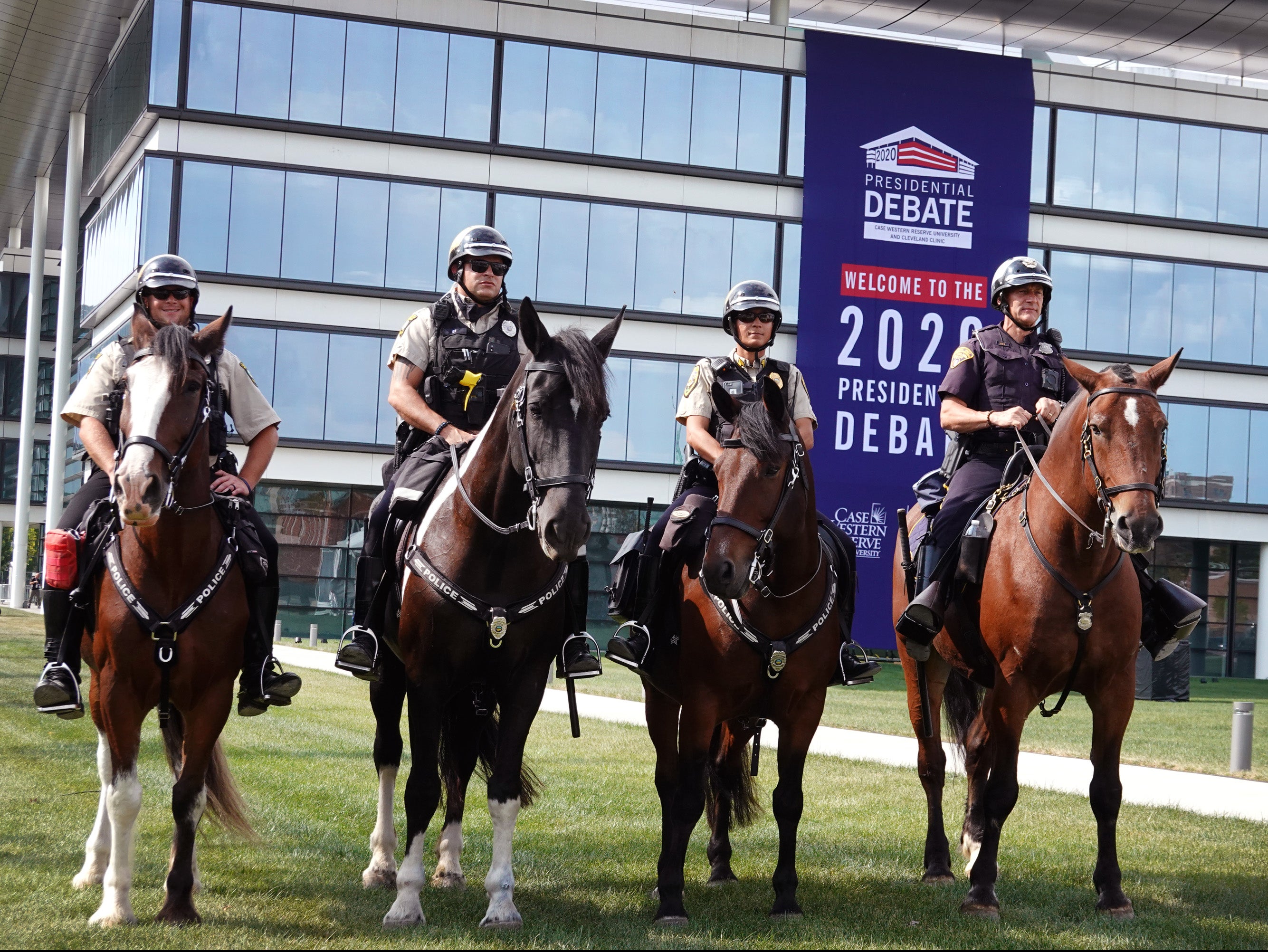 Mounted police patrol around the Samson Pavilion at Case Western Reserve University ahead of the presidential debate