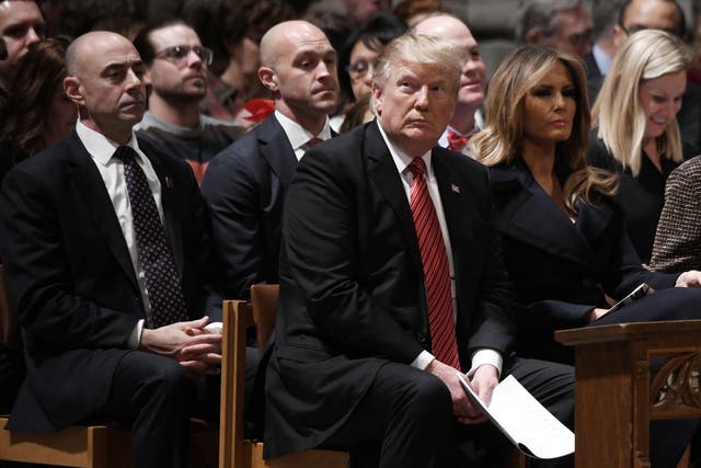 US President Donald Trump and first lady Melania Trump attend Christmas Eve services at the National Cathedral on 24 December 2018 in Washington, D.C. 