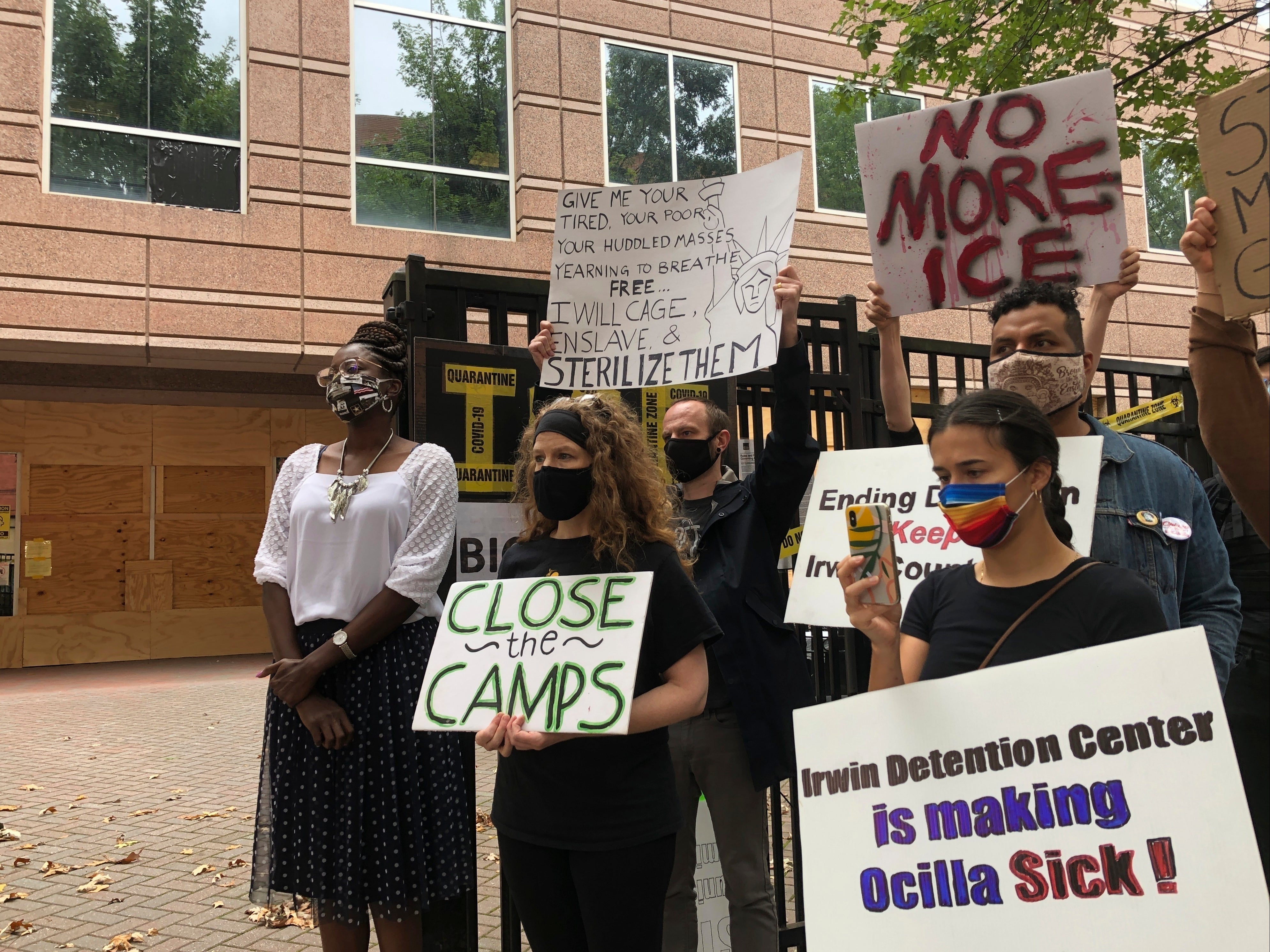 Dawn Wooten (left), a nurse at Irwin County Detention Centre in Ocilla, Georgia, leads a protest after reporting suspicious amount of women receiving potentially unneeded surgeries from a rural gynaecologist