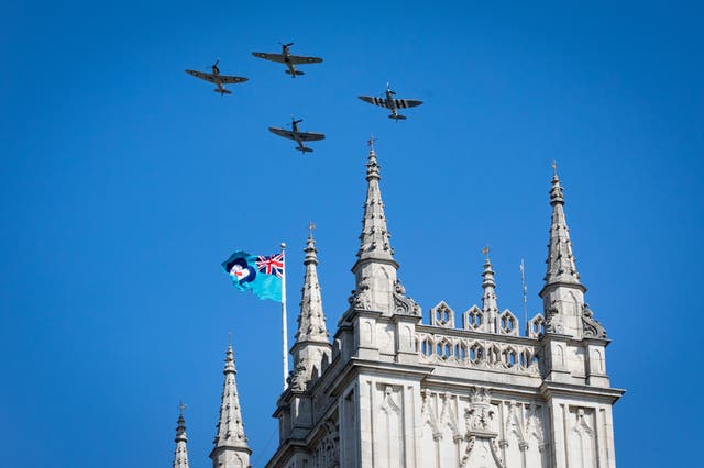A flypast to mark the 80th anniversary of the Battle of Britain flies over Westminster Abbey, London