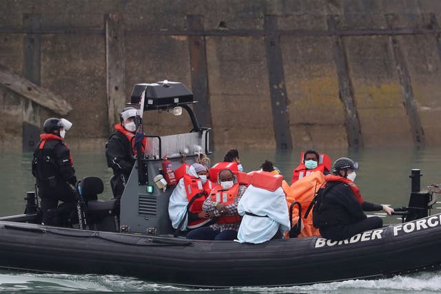 A group of people thought to be migrants are brought into Dover, Kent, by Border Force following a small boat incident in the Channel