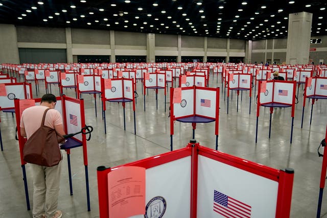 A voter completes his ballot on the day of the primary election in Louisville, Kentucky, US 23 June, 2020.