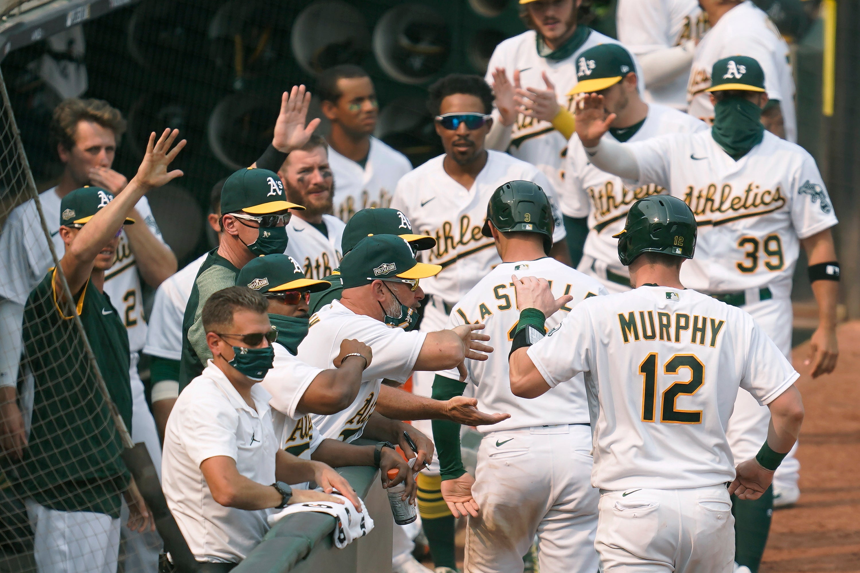 Pinder delivers timely hit, A's advance in playoffs at last a
