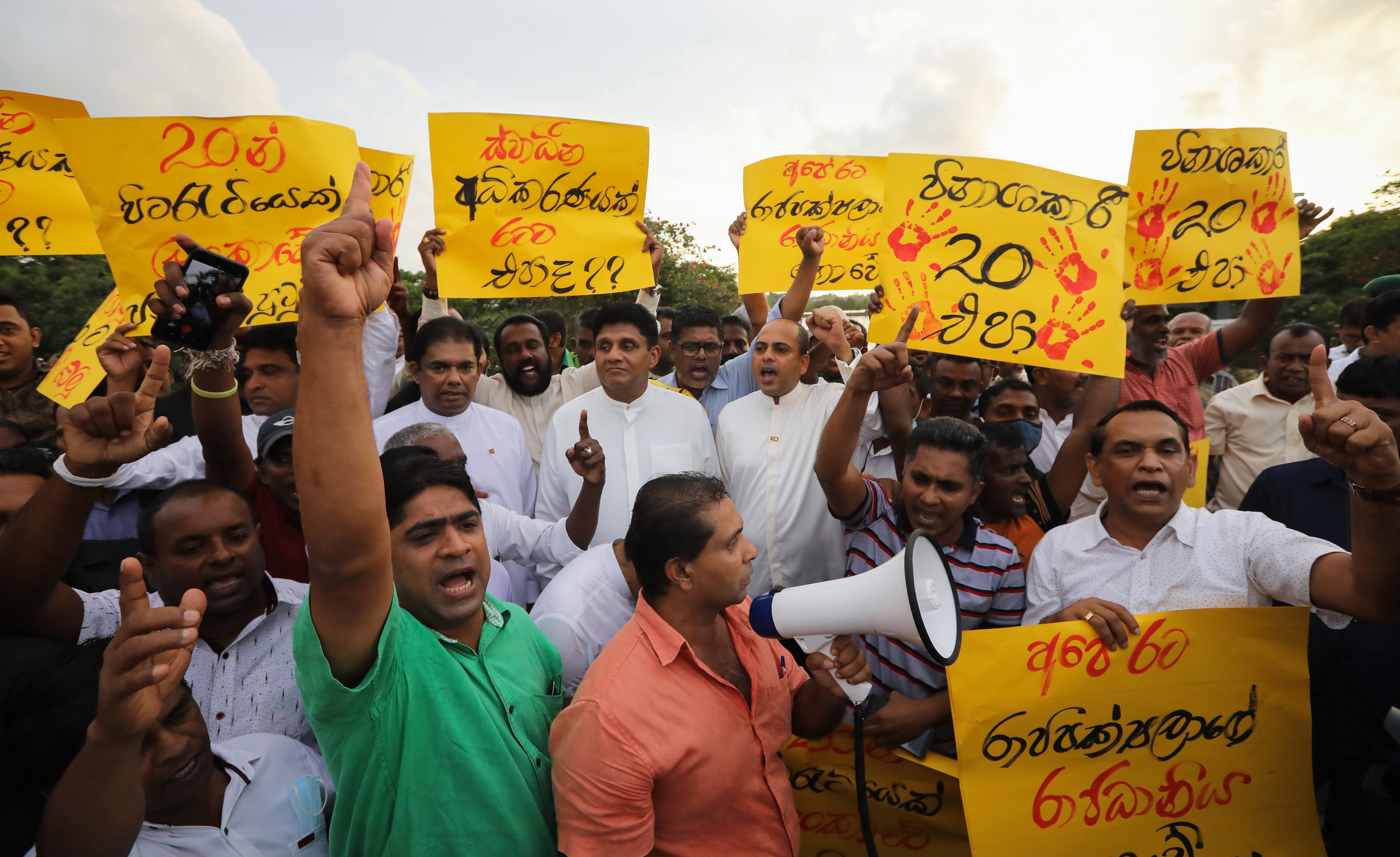 Sri Lankans protest against proposed constitutional amendments they fear will give the president unlimited powers