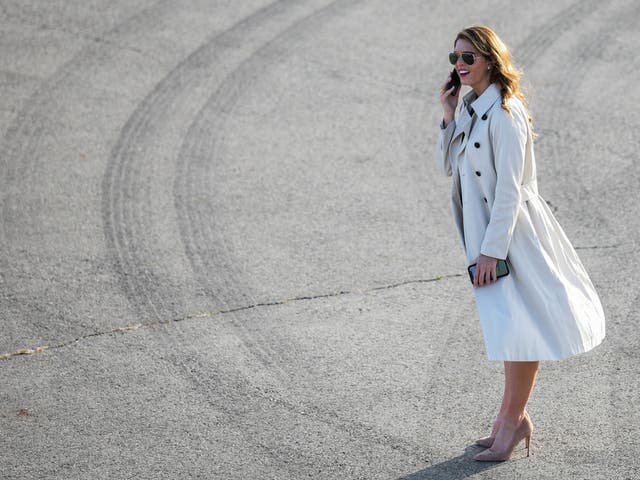Hope Hicks is back on Air Force One two weeks after catching coronavirus.
