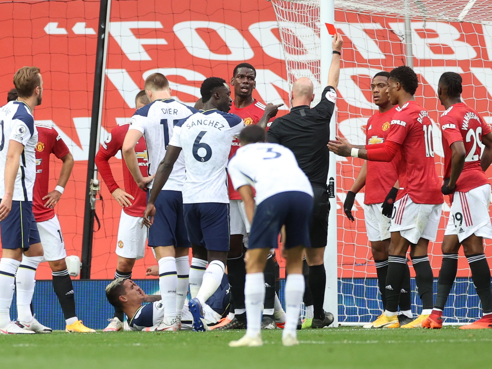 Anthony Martial is sent off by referee Anthony Taylor