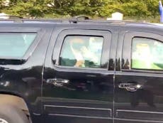 Trump leaves hospital suite for photo op drive-by in motorcade amid crowds of supporters