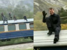 Tom Cruise waves at people from atop speeding train while filming dangerous Mission: Impossible 7 stunt