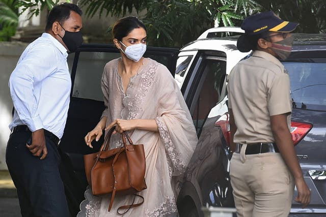 Bollywood star Deepika Padukone arrives for questioning at the NCB offices in Mumbai