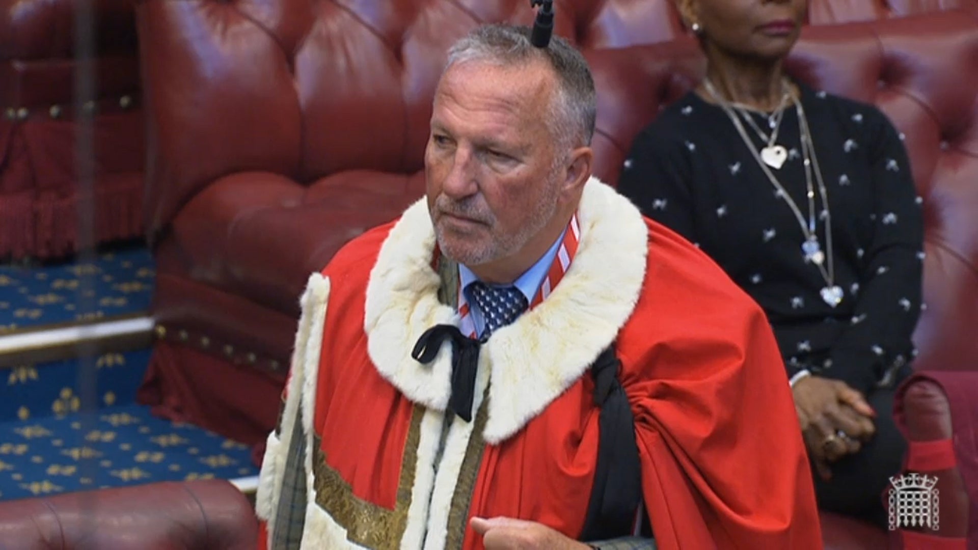 Ian Botham takes his seat in the House of Lords