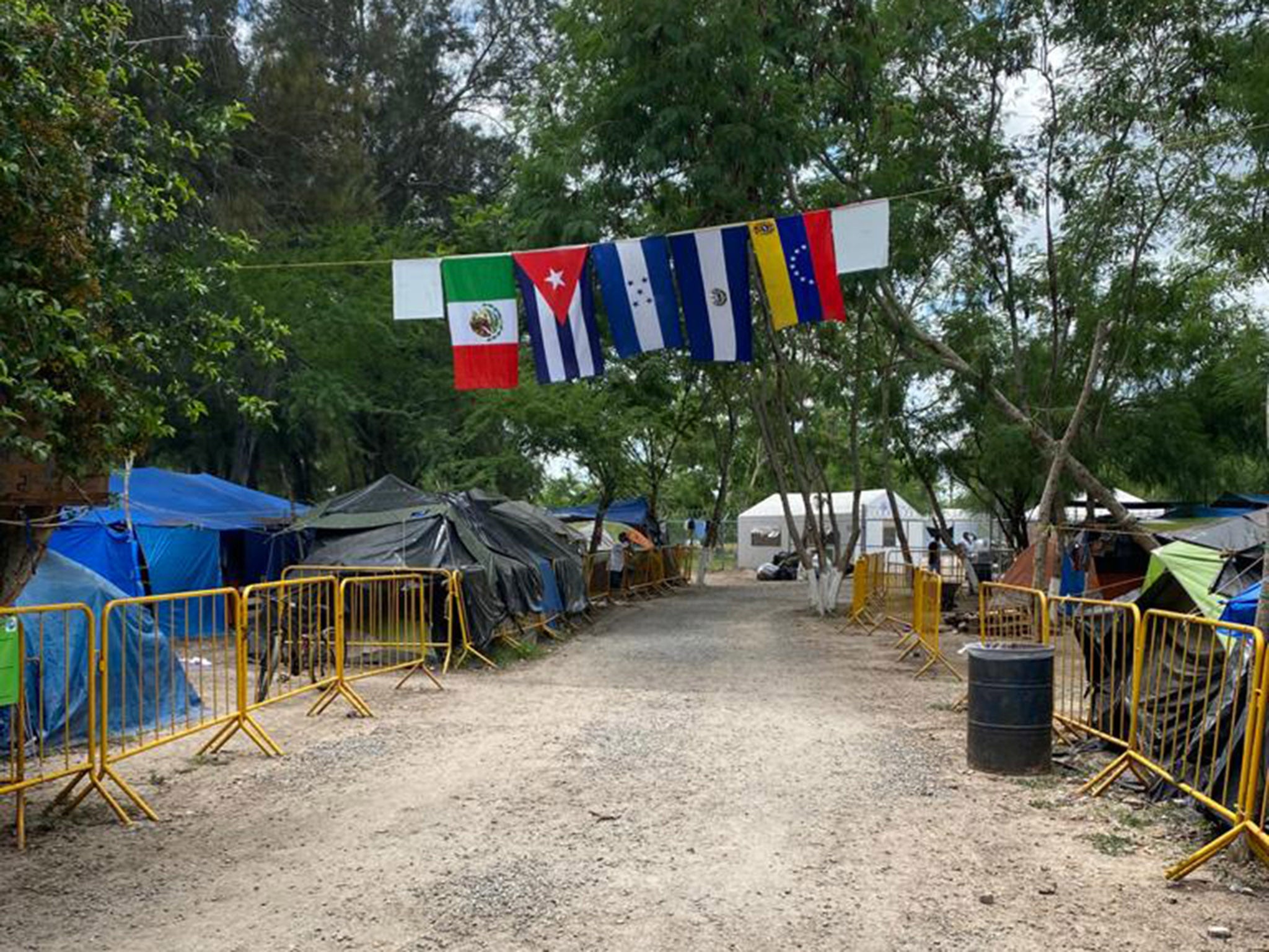 Asylum seekers from (left to right) Mexico, Cuba, Honduras, Argentina and Venezuela reside at the camp in Matamoros