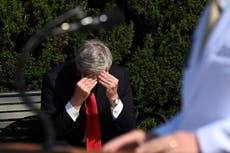 Trump and coronavirus: Viral picture shows White House chief of staff rubbing his head during president’s health briefing