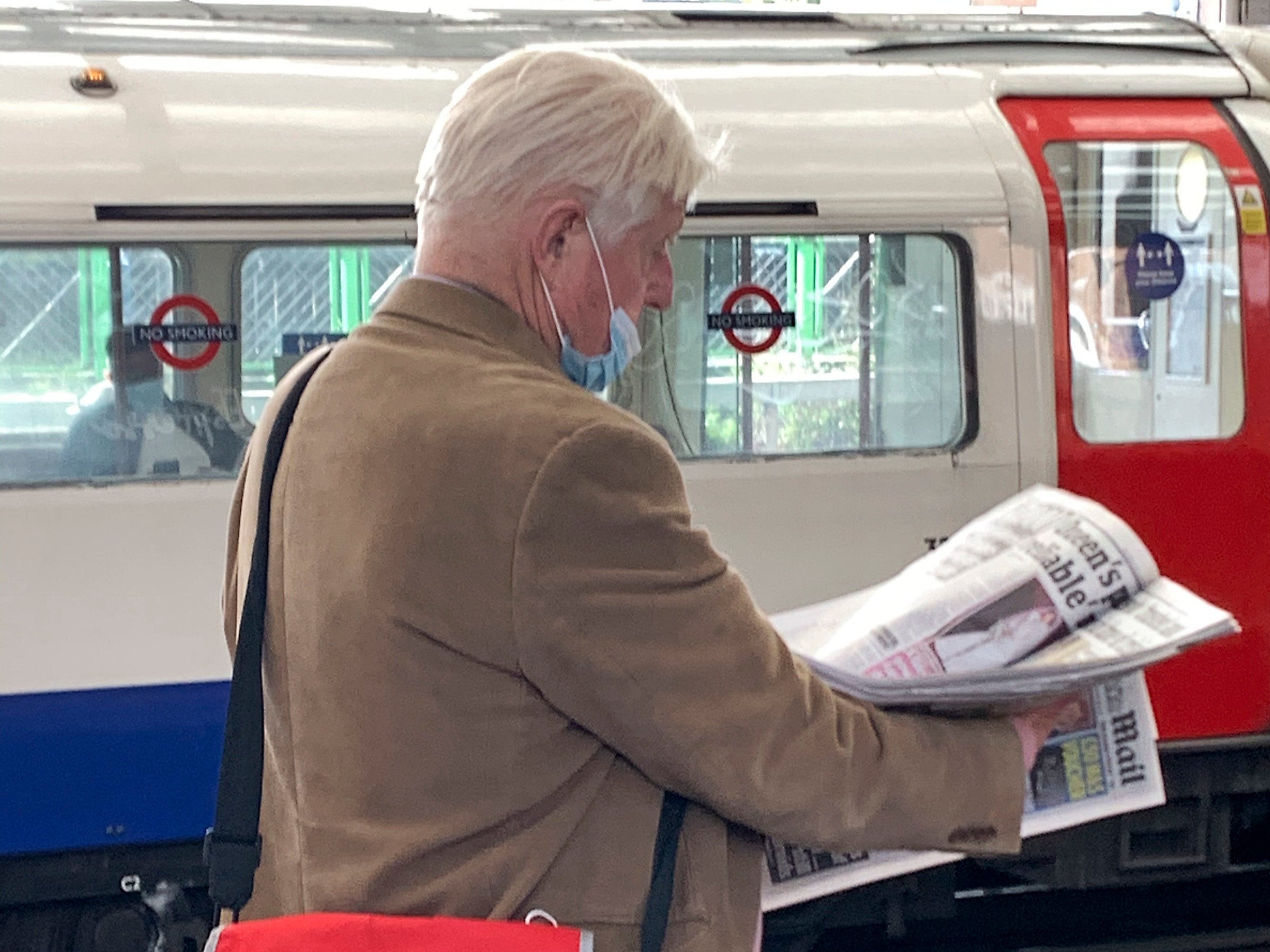 Mr Johnson was photographed wearing the mask incorrectly at a Bakerloo line station on Monday