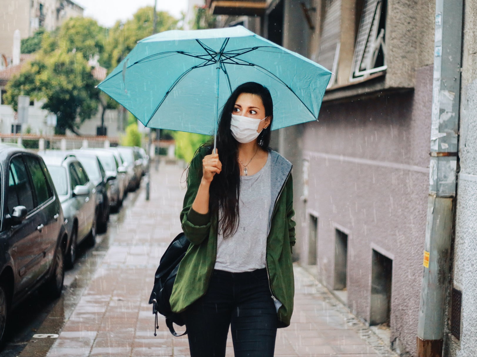 Face masks are less effective in the rain, experts warn