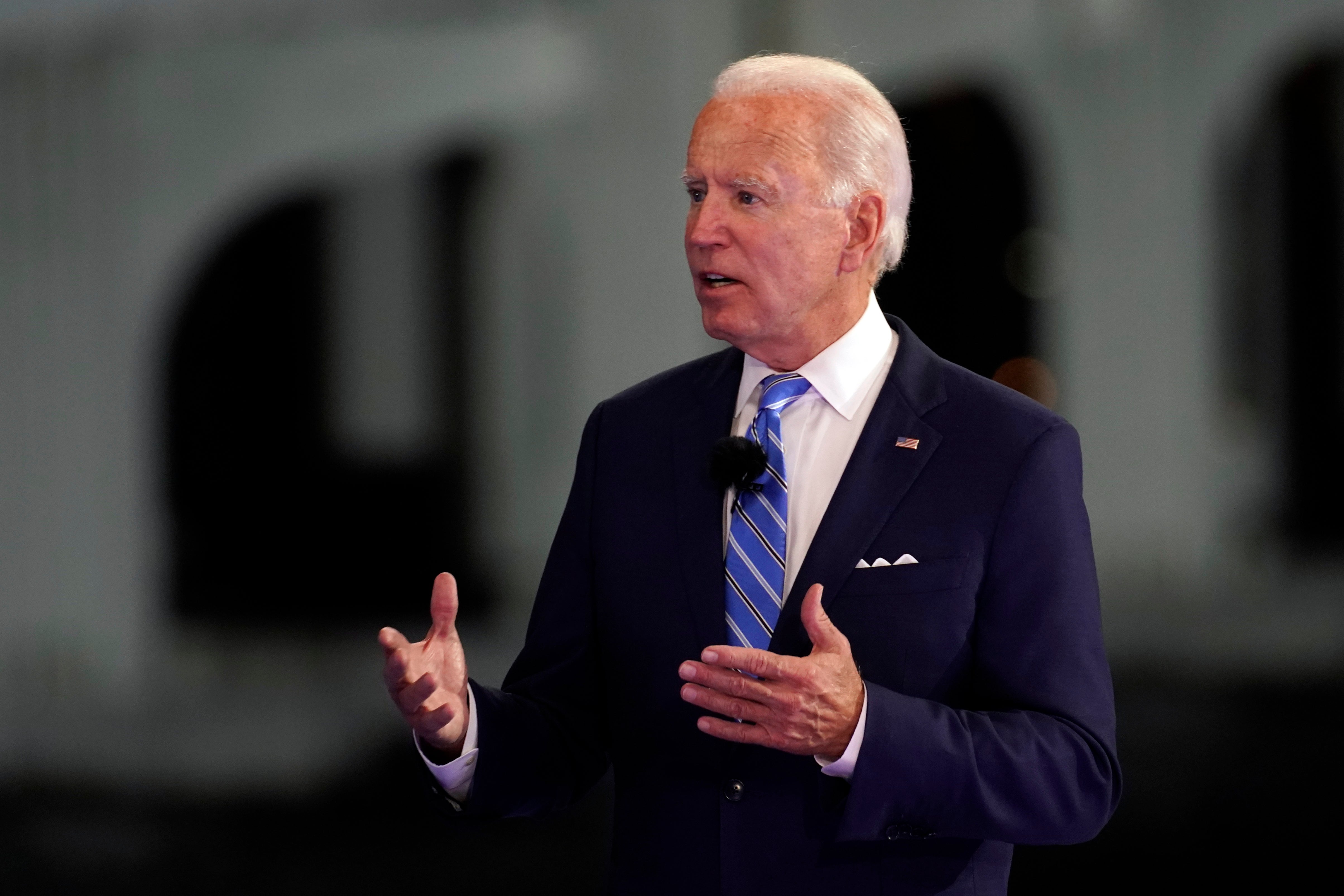 Biden news – live: Ex-VP condemns Trump’s ‘macho’ Covid response and says ‘masks matter’