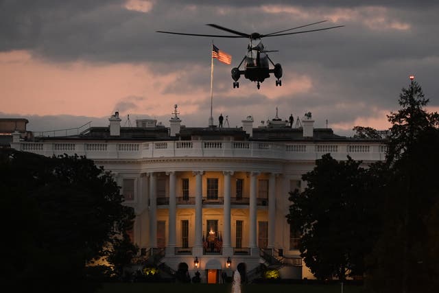 Trump returns to the White House on Marine One after being treated for Covid-19 at Walter Reed National Military Medical Centre