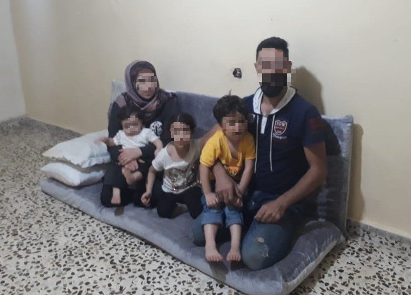 Ali (left) and his family are living in a small flat and have had to move numerous times since March