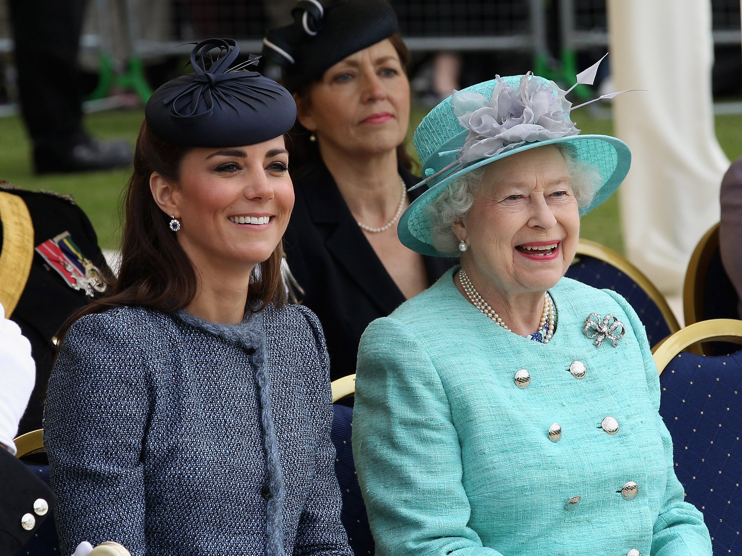 Catherine, Duchess of Cambridge and Queen Elizabeth II visit Vernon Park in Nottingham on June 13, 2012