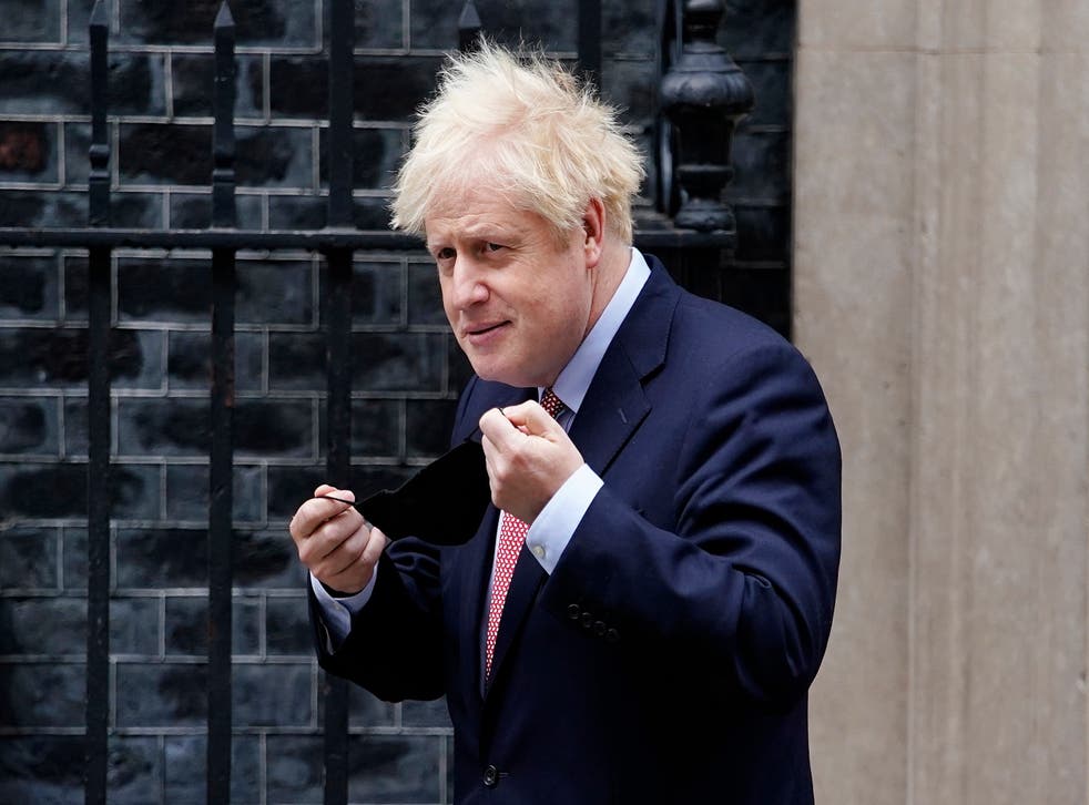 Boris Johnson leaving 10 Downing Street to deliver his speech to the online Conservative Party conference 
