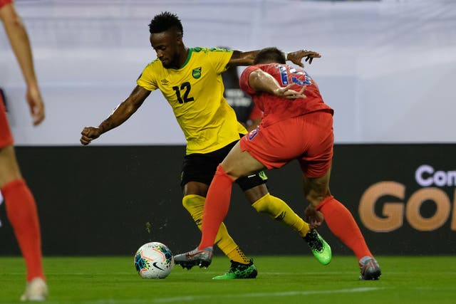 Junior Flemmings pictured playing for his national team, Jamaica