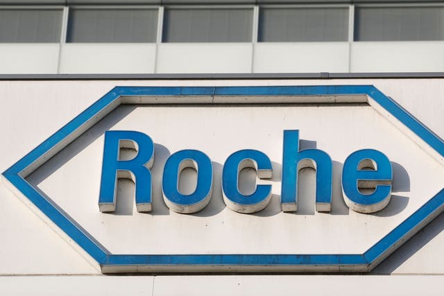 The logo of the pharmaceutical giant Roche outside its headquarters in Basel, Switzerland. 