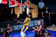 James and Davis carry Lakers back to beat Miami and lead NBA Finals