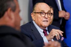  Rudy Giuliani ‘spotted maskless at fundraiser’ after coughing on TV
