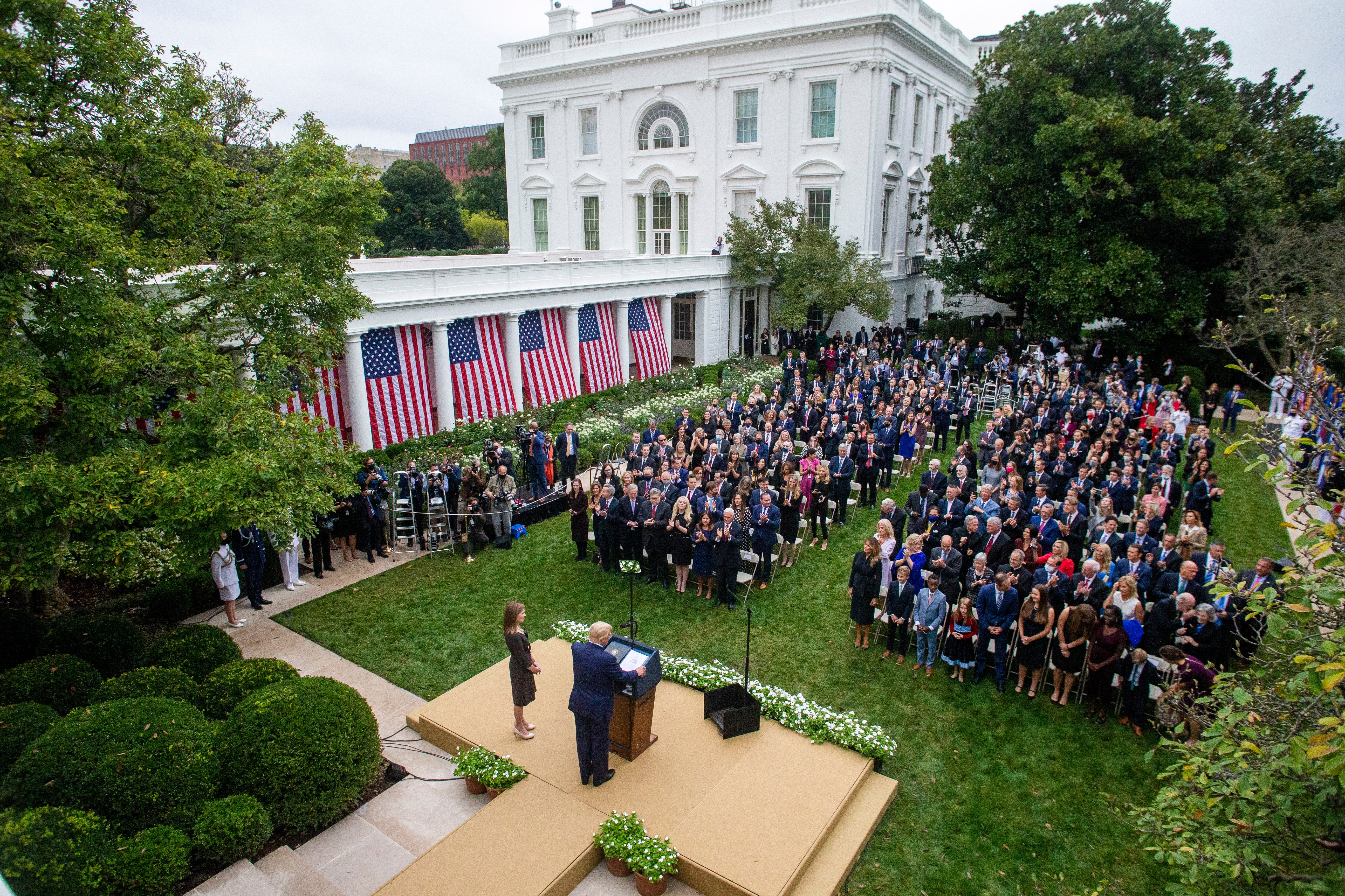Donald J. Trump introduces Judge Amy Coney Barrett as his nominee to be an Associate Justice of the Supreme Court during an event many see as the "super-spreader event" that got Mr Trump and other sick with coronavirus.