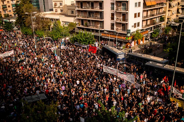 Protesters gather outside the court where the trial of Golden Dawn is taking place