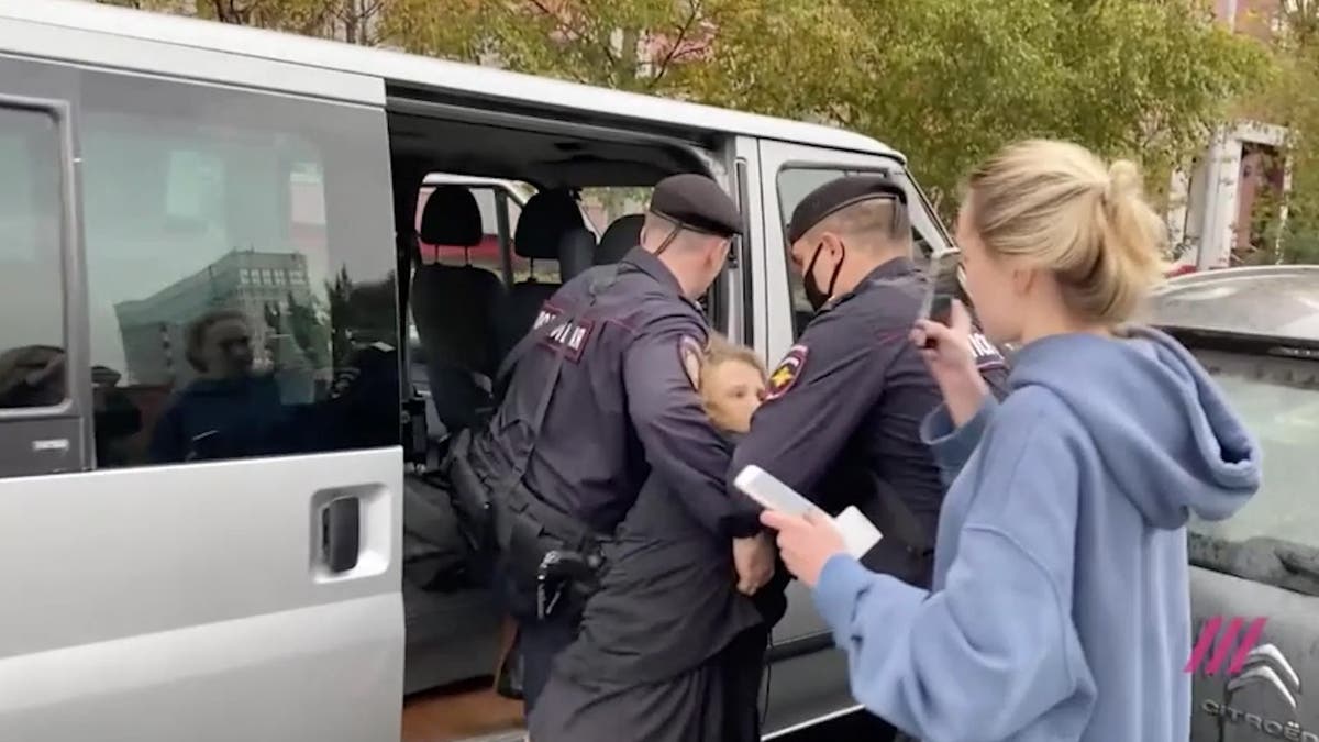Pussy Riot members arrested after LGBT+ flag protest | The Independent