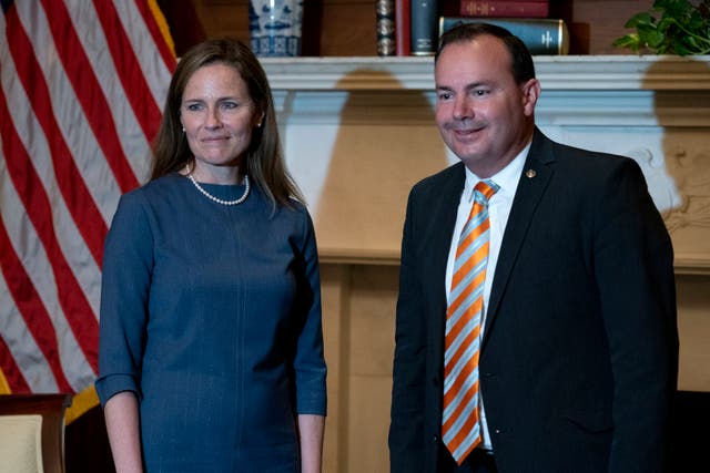 Senator Mike Lee, right, with Supreme Court Justice Amy Coney Barrett at the White House in September.