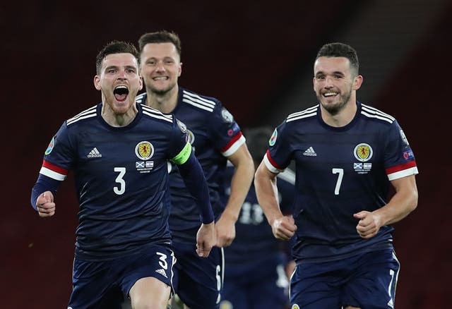 Scotland celebrate after winning the shoot-out