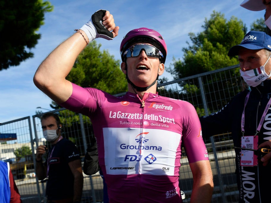 Arnaud Demare celebrates after crossing the line