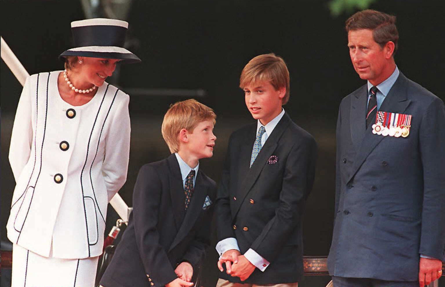 Princess Diana and Prince Charles with children Prince Harry and William at Buckingham Palace to watch the VJ Day commemoration in 1995