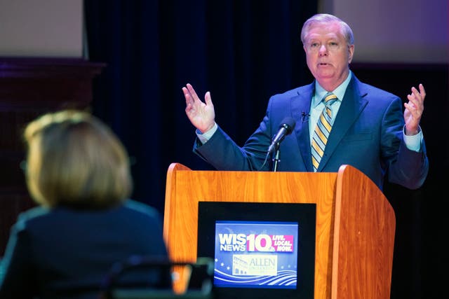 Lindsey Graham faces off in the South Carolina US Senate debate with Democratic challenger Jaime Harrison on 3 October 2020.